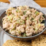 spicy tuna salad in a bowl with crackers