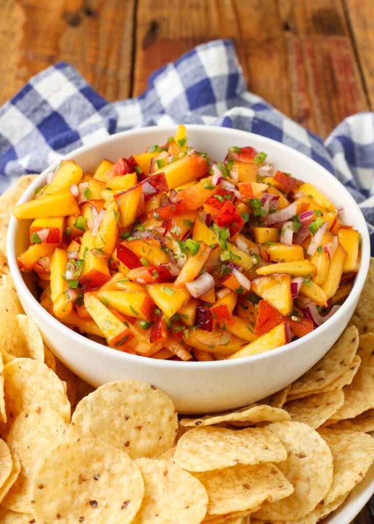 diced peaches, onion, and jalapeno salsa in white bowl