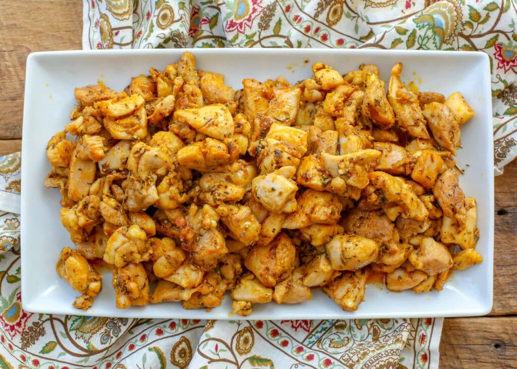 bite-size pieces of chicken sauteed and seasoned with plenty of spices