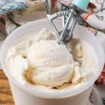 close up of ice cream in scoop in container