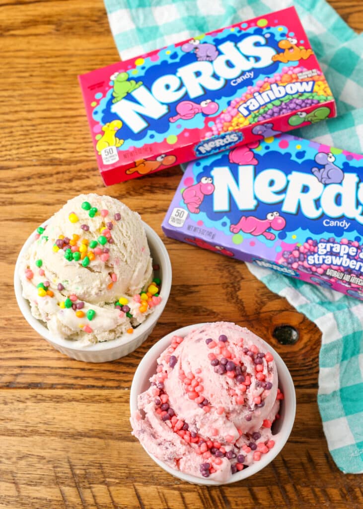overhead photo of bowls of ice cream on table next to nerds candy