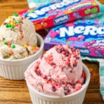nerds candy boxes on table next to bowls of ice cream