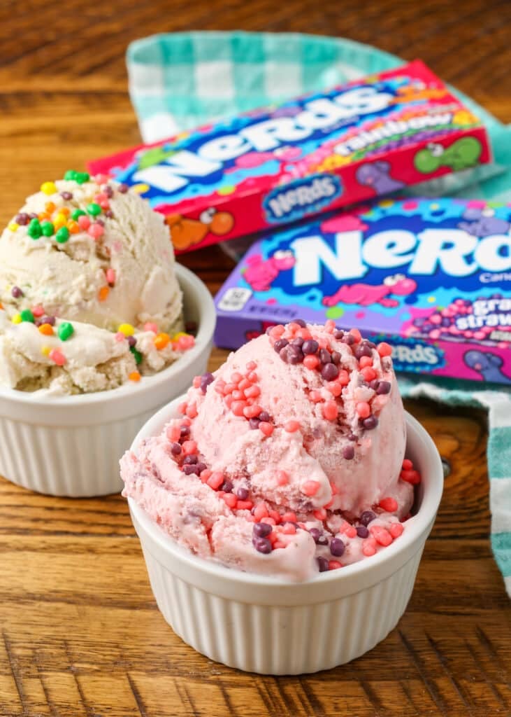 nerds candy boxes on table next to bowls of ice cream