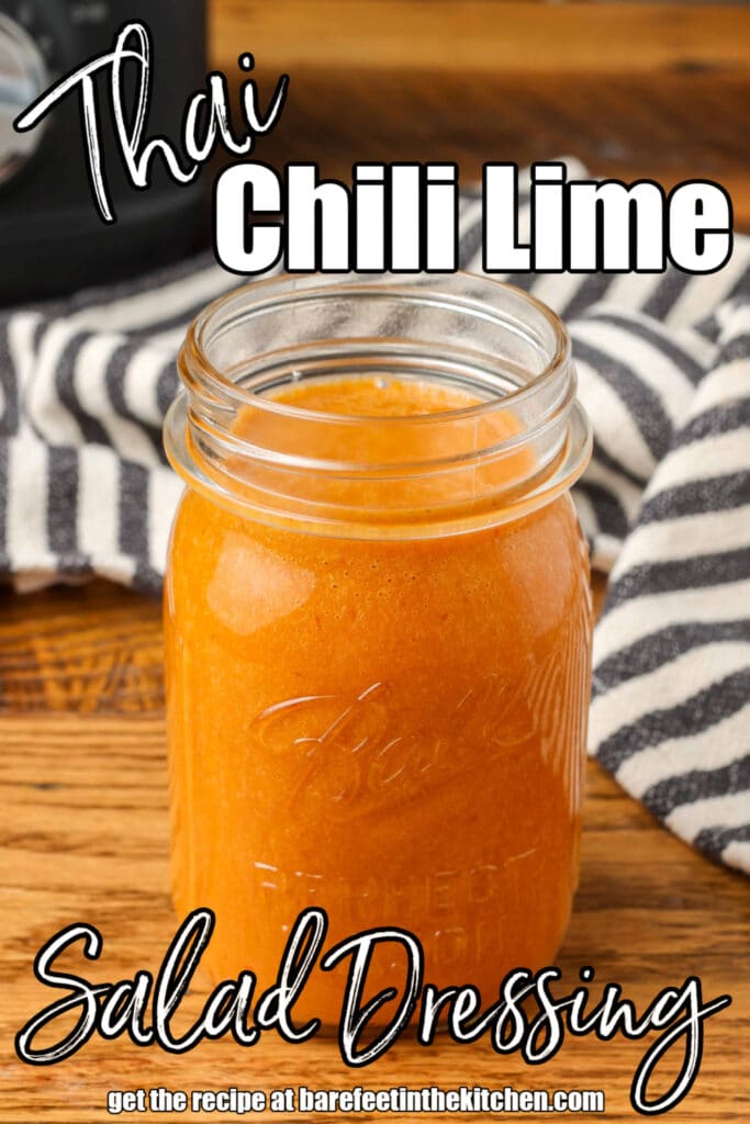 asian salad dressing in a mason jar with a striped linen and text overlay describing photo