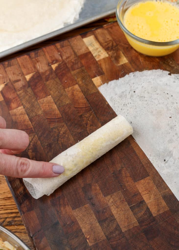 rolled lumpia on cutting board