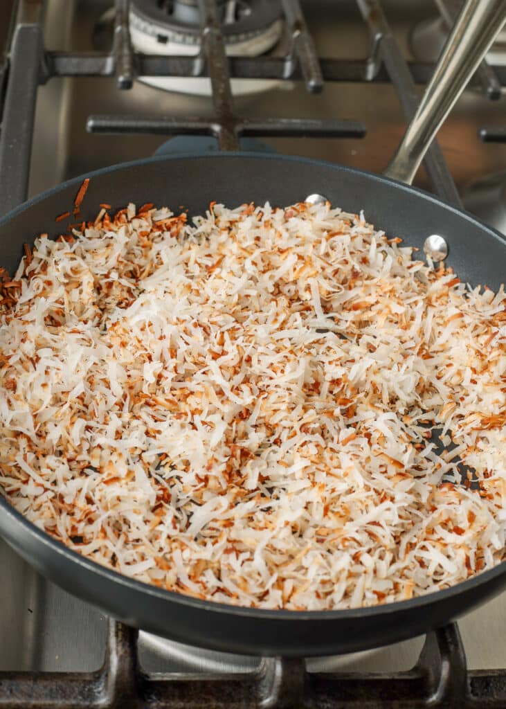 golden toasted coconut in non stick pan