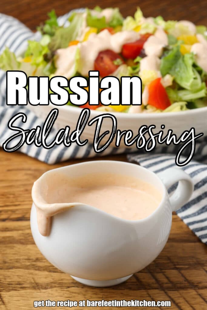 russian dressing in a salad dressing boat with a spout and a salad