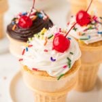 Wafer cones filled with cupcakes.