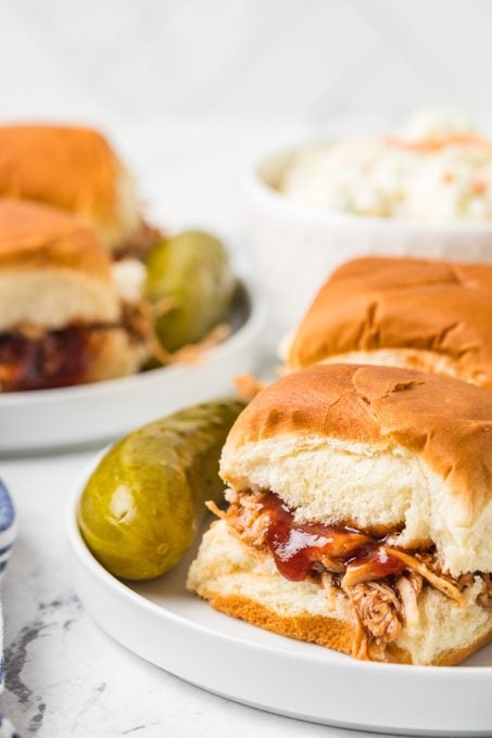 BBQ sauce on small chicken sandwiches.