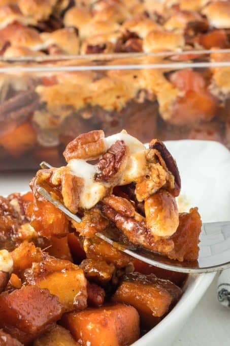 A bite of Molasses Sweet Potato Casserole.