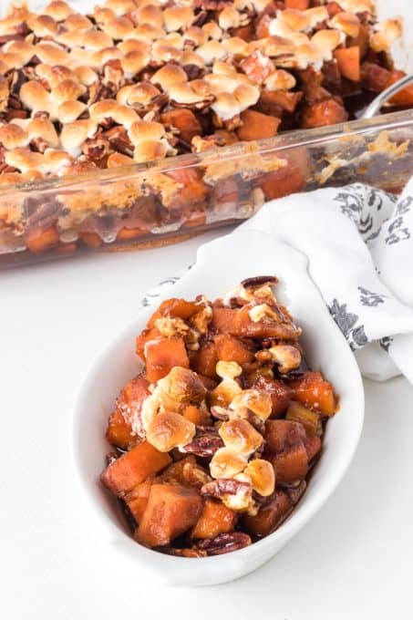 Sweet potatoes with molasses, pecans, and marshmallows.