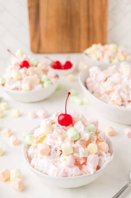 A fluffy fruit salad with mini marshmallows.