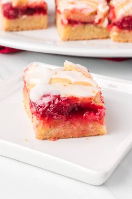 Easy pie bars with store bought pie filling made of cherries.