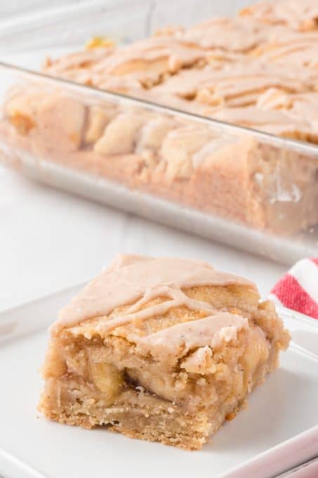 Easy Pie Bars with apple pie filling and a spiced glaze.