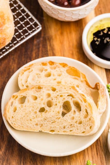 Two slices of bread on a plate.