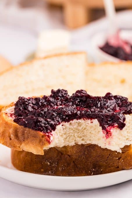 Jelly tops some freshly baked bread from a Dutch Oven.