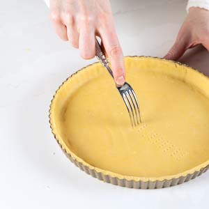 Using fork on dough