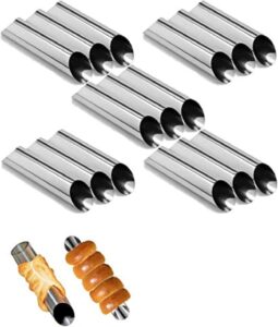 Group of shiny stainless steel skewers arranged diagonally, with two skewers showing grilled sausage spirals at the bottom (kebab/BBQ theme)