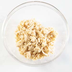 dough in glass mixing bowl