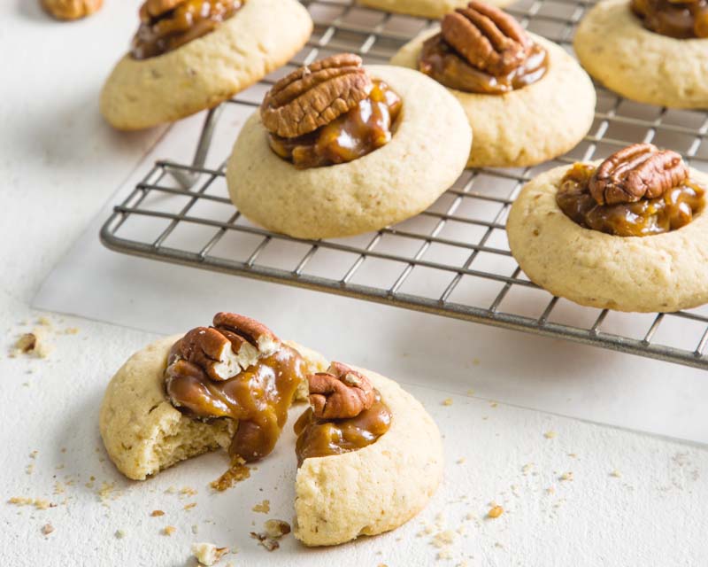 Bourbon Pecan Thumbprint Cookies on cooling rack