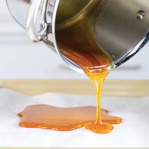 Pouring caramel on pan