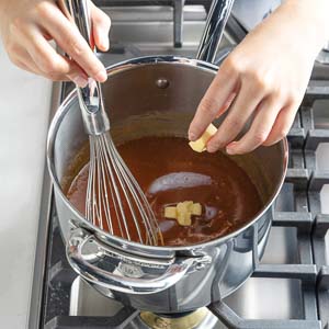 Adding butter to caramel