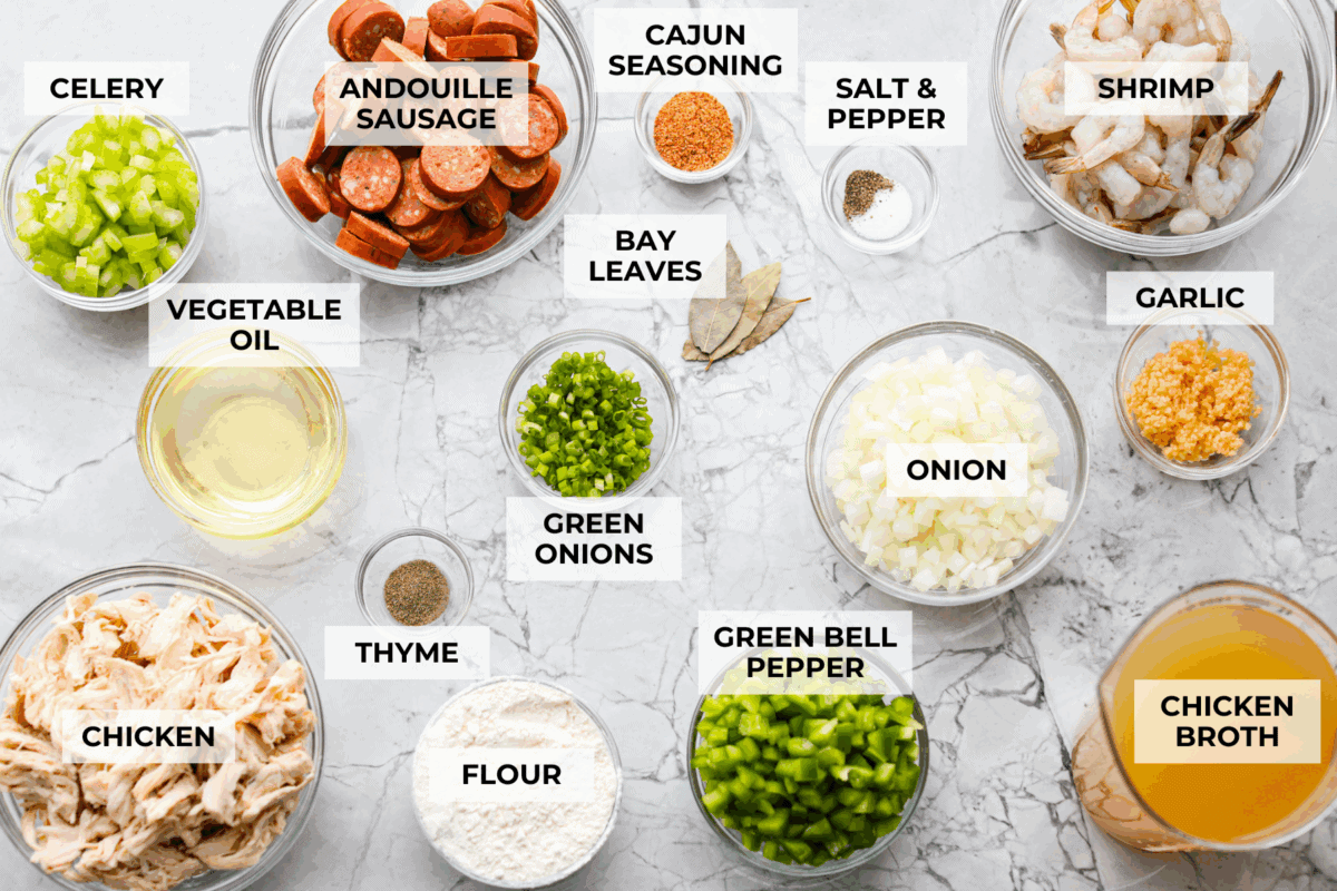 Overhead shot of labeled New Orleans gumbo ingredients. 
