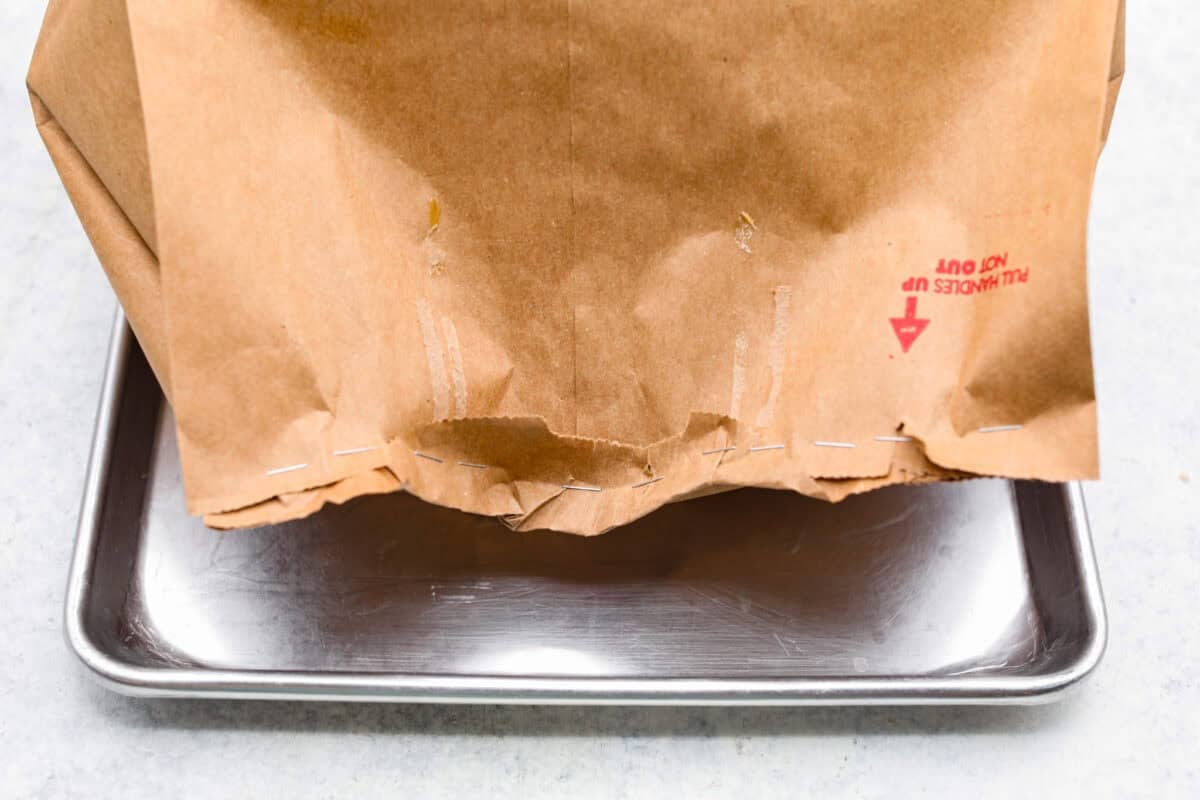 pictures of the brown bag folded over and stapled shut. 