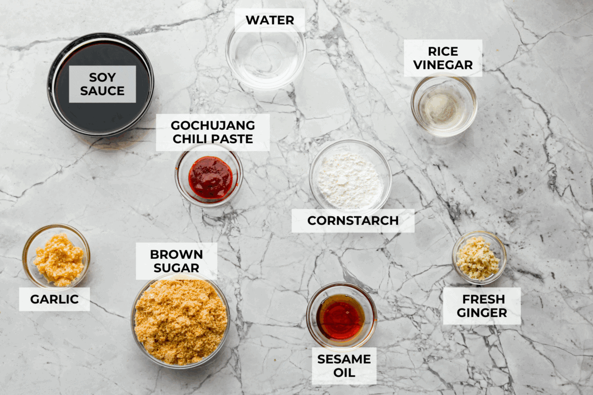 Overhead shot of labeled Korean BBQ sauce ingredients.