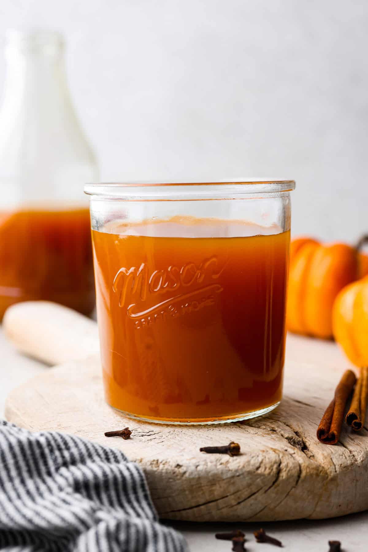 Close up shot of pumpkin juice in a glass cup. 