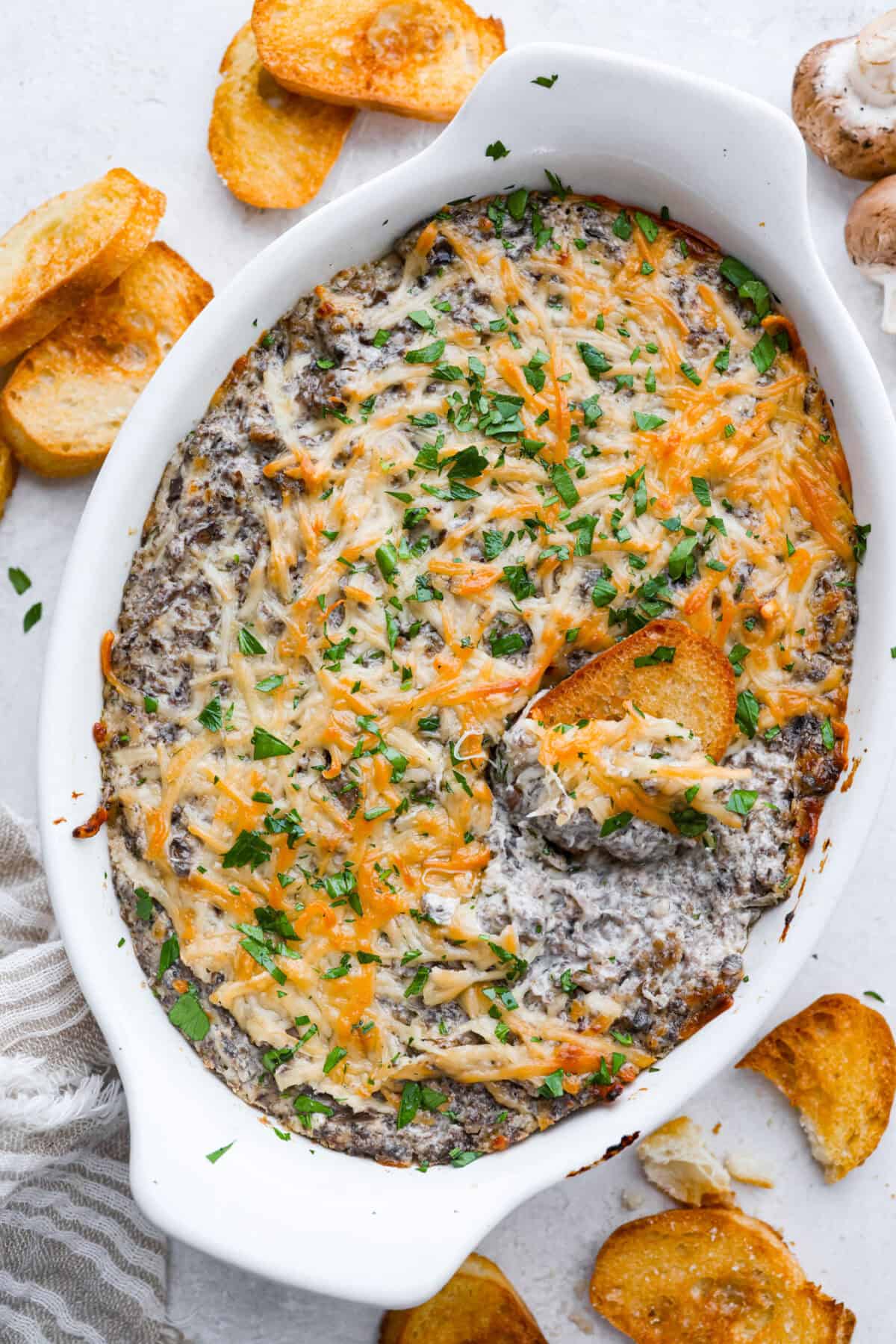 Overhead shot of the baked stuffed mushroom dip.