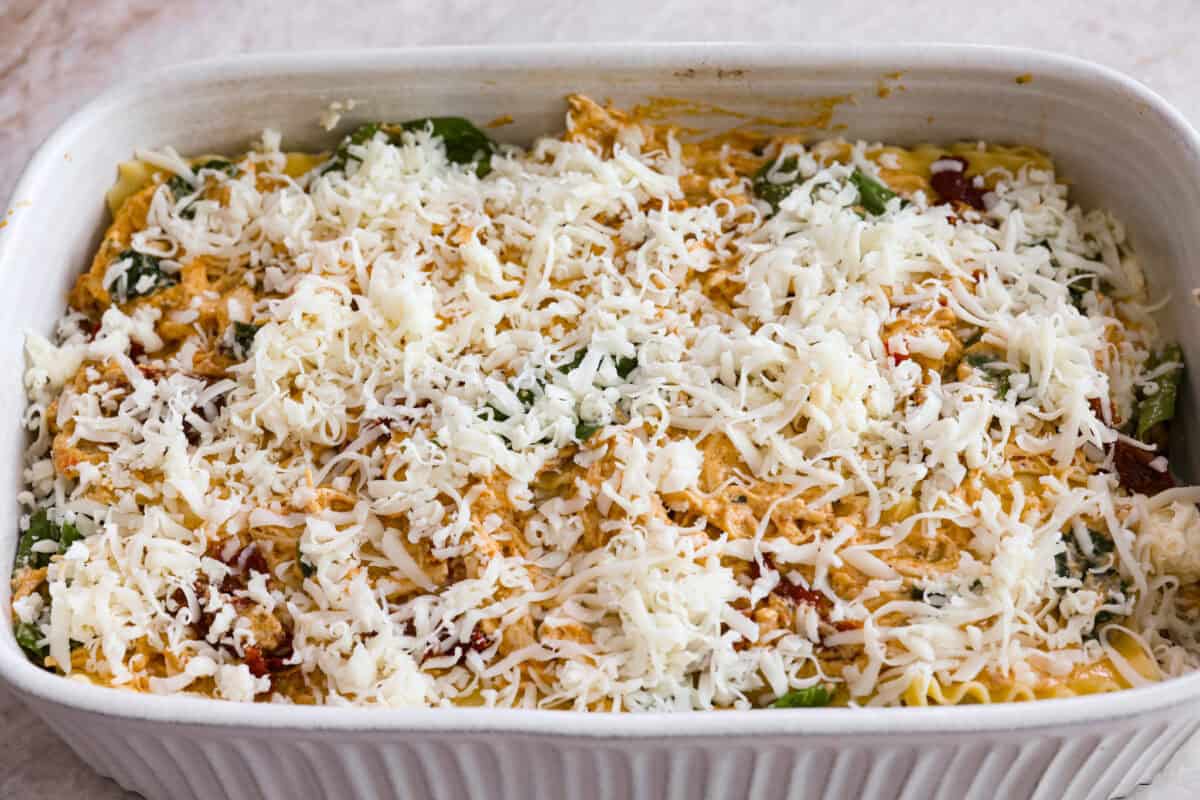 Last layer of cheese added to the top of the marry me lasagna ready to  be covered with foil before it goes into the oven. 