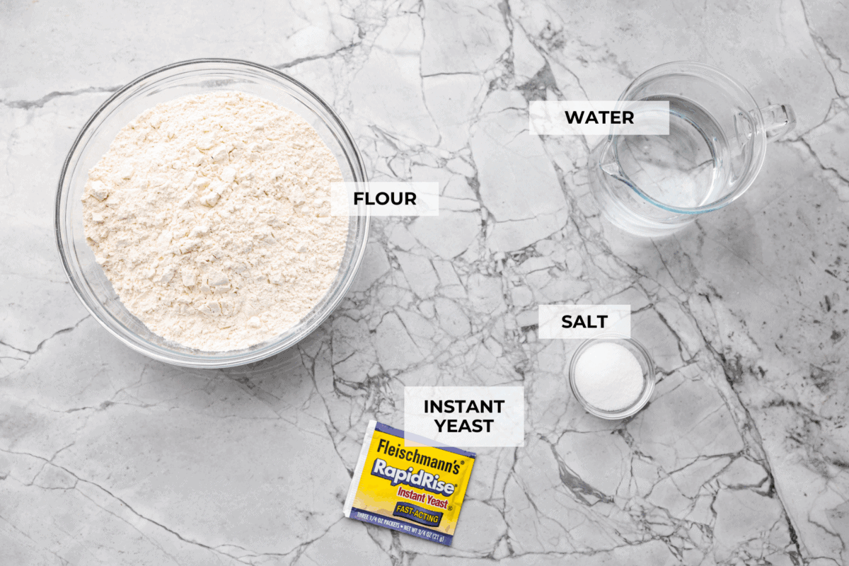 Overhead shot of labeled artisan bread ingredients. 