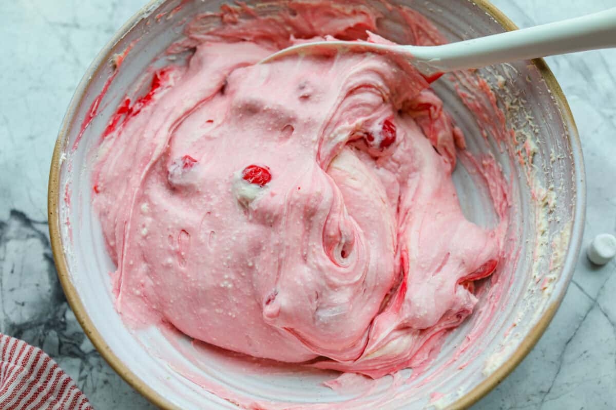 Cherry pie filling added to the ream cheese mixture. 