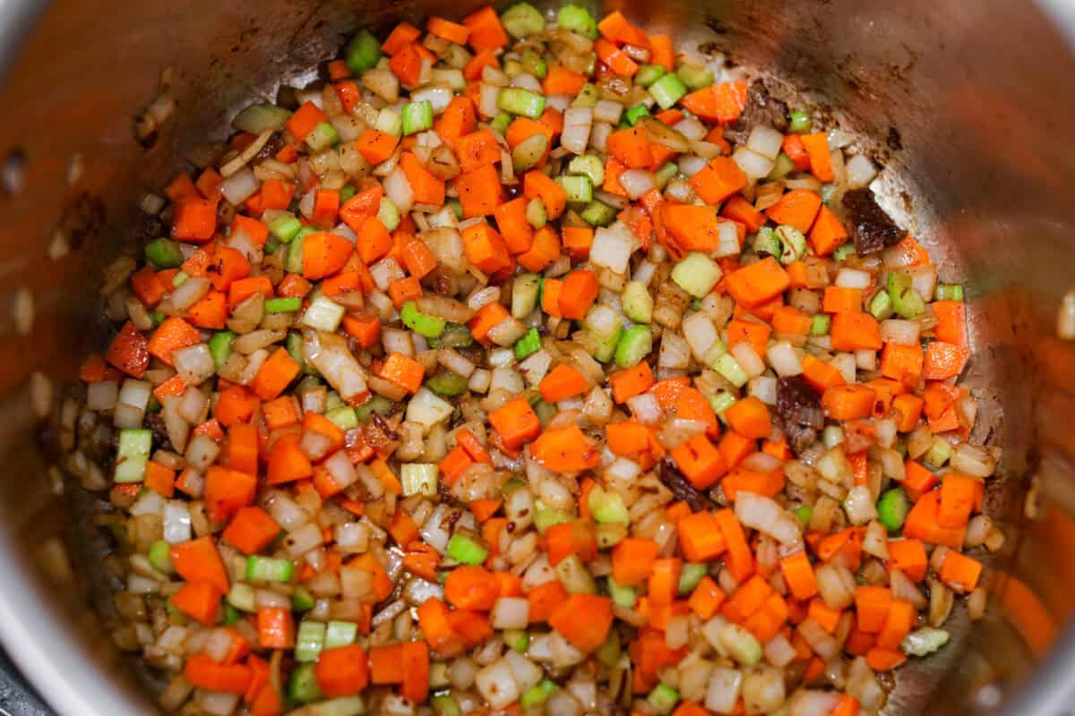 Veggies added to the pot and cooking on lower heat. 
