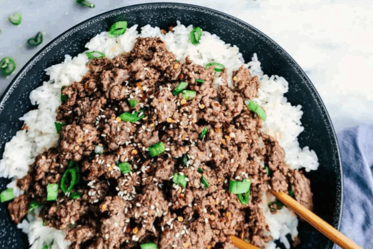 Korean Beef and Rice Bowl with chopsticks. 