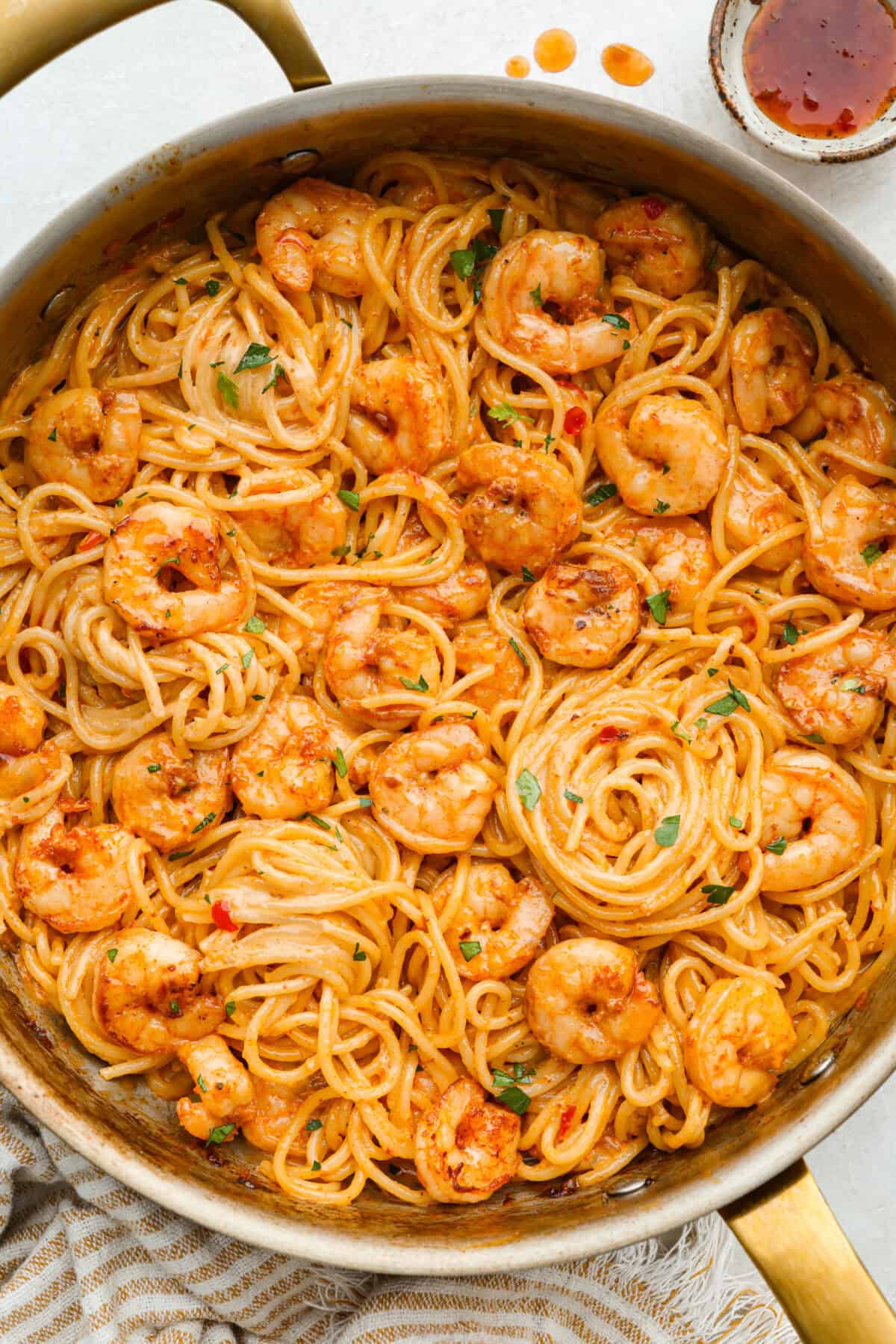 Skillet of bang bang shrimp pasta.