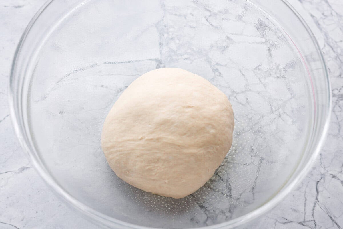 Ball of dough in a bowl. 
