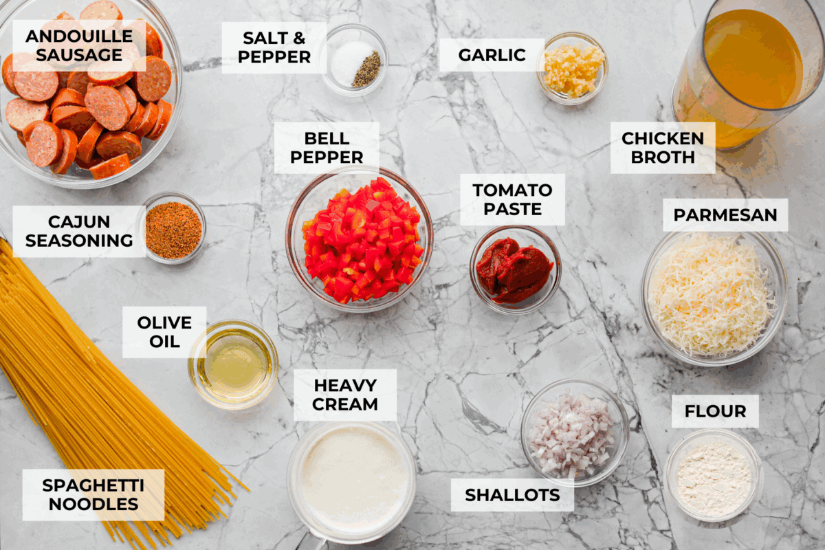 Overhead shot of labeled Cajun Spaghetti ingredients. 