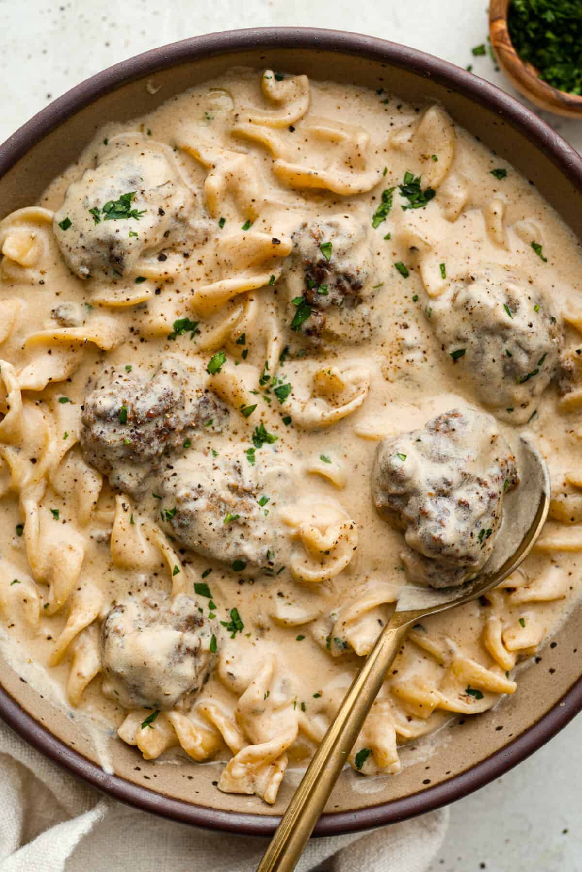 Overhead shot of plated Swedish meatball soup. 