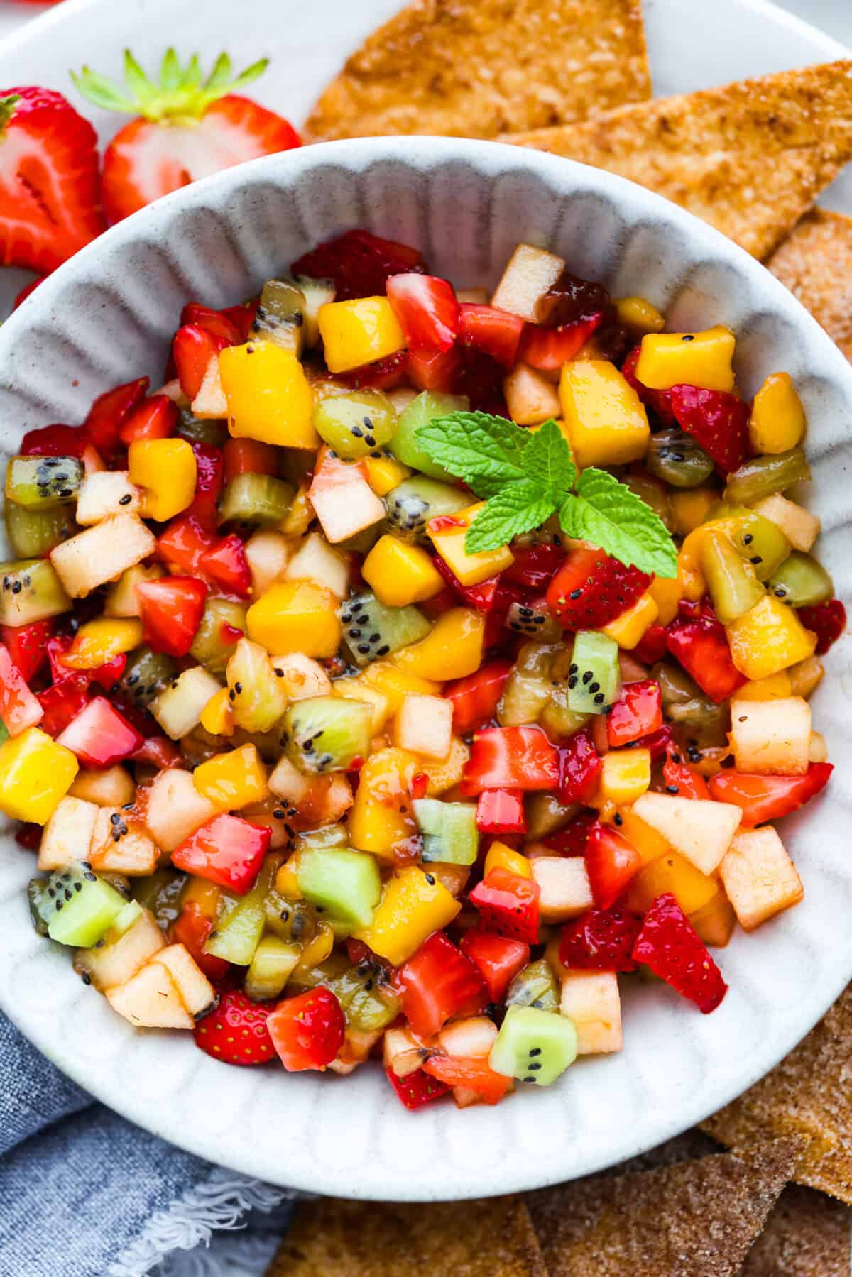 Close up shot of a bowl of fresh fruit salsa. 