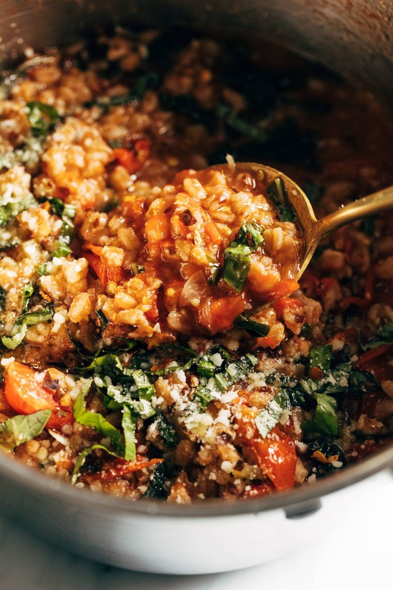 One pan farro with tomatoes and kale.