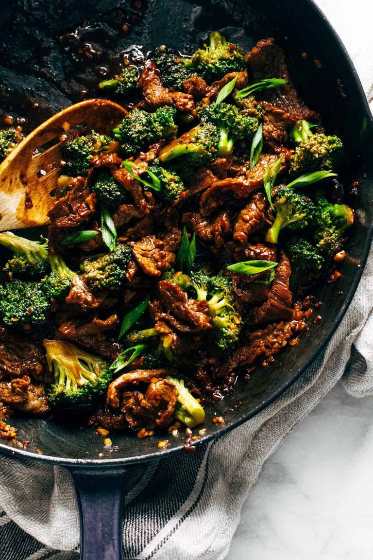Beef and broccoli in a cast iron.