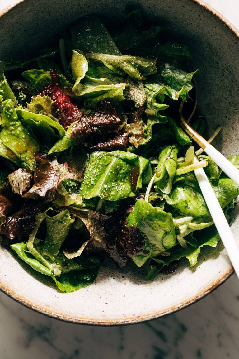 Simple green salad in a serving bowl.