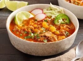 30 minute posole in a bowl topped with garnishes