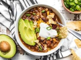 This Slow Cooker Vegetarian Lentil Chili makes a huge batch, is packed with flavor and nutrients, and can be made for only about 5 dollars! Budgetbytes.com