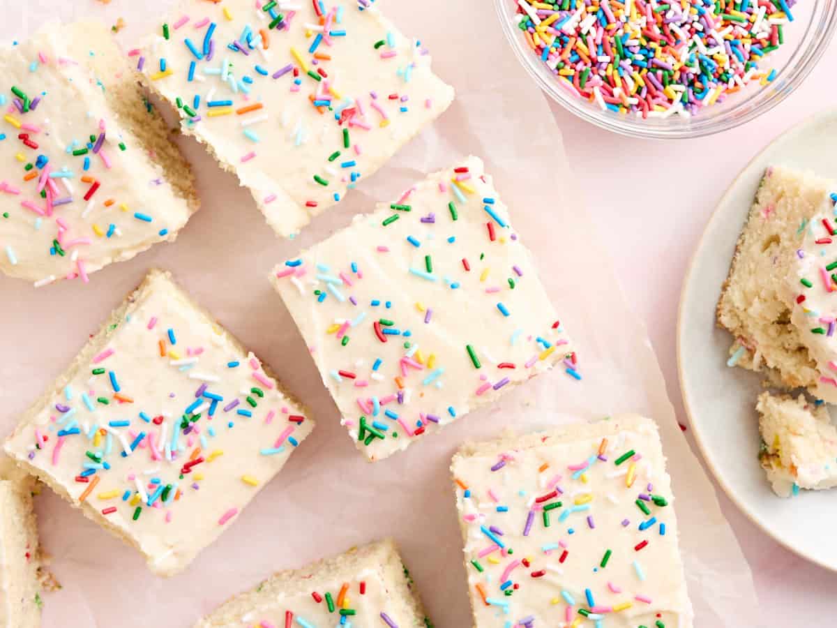 Overhead view of frosted  and sliced cookie dough bars.