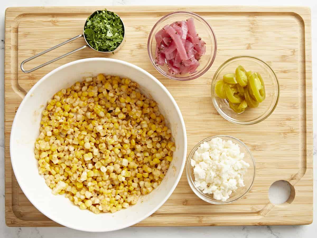 Salad ingredients for Mexican street corn salad.