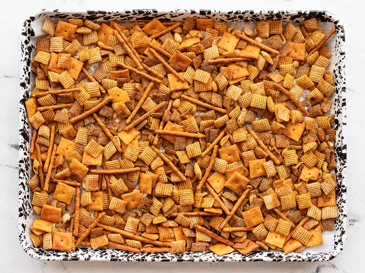 Baked snack mix on the baking sheet