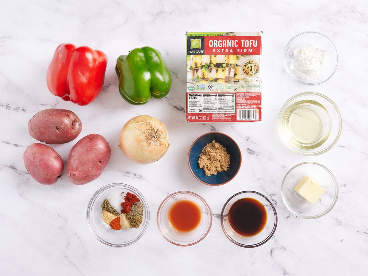 Ingredients to make sheet pan Cajun tofu and vegetables. 